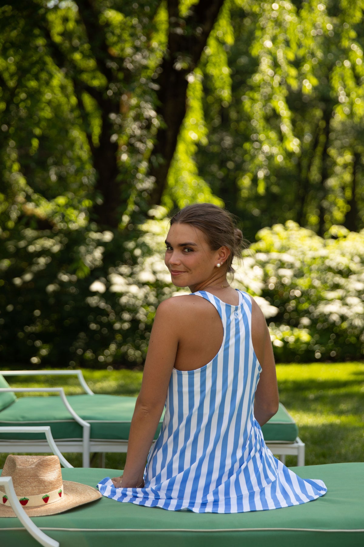 Club & Court All-Sport Buffy Dress in blue stripe, seated